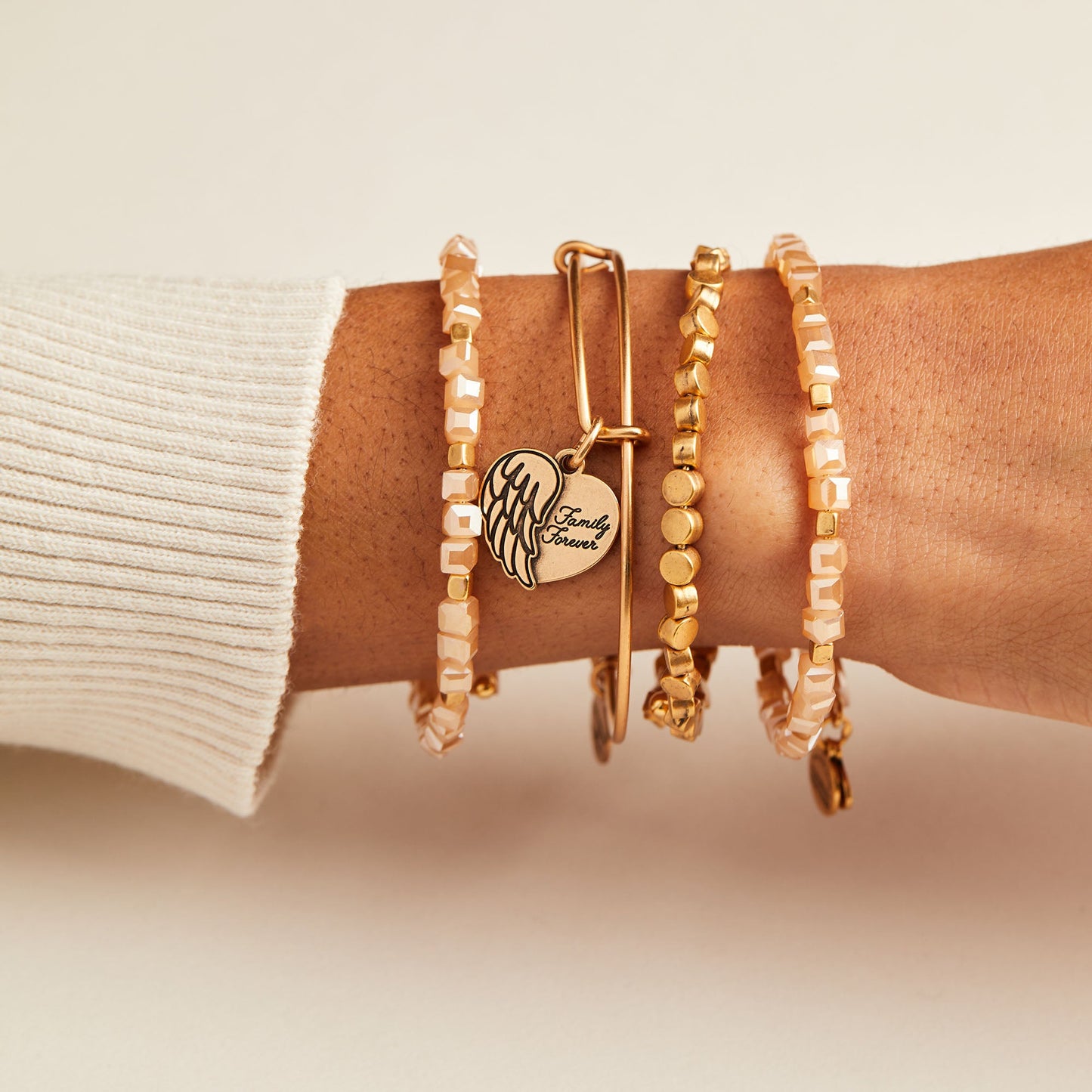 Family Forever' Angel Wing Heart Charm Bangle
Rafaelian Silver
