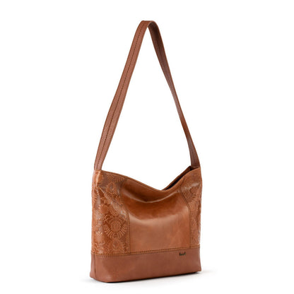 The Sak De Young Hobo Bag in Tobacco Floral Embossed Leather