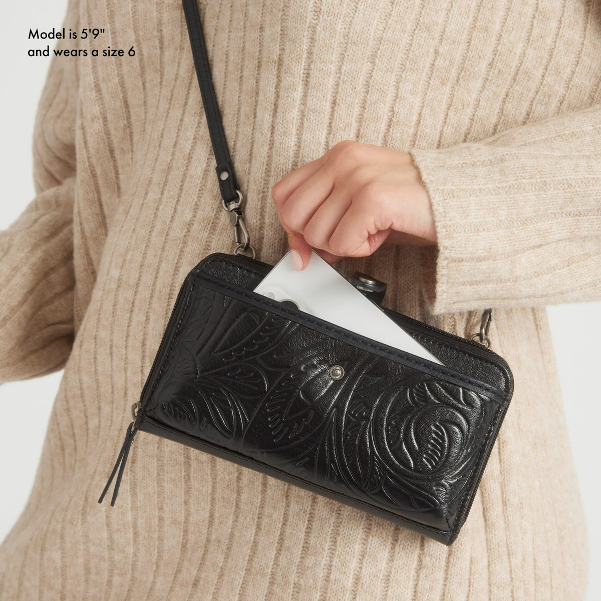 The Sak Iris Smartphone Wallet in Black Leaf Embossed Leather