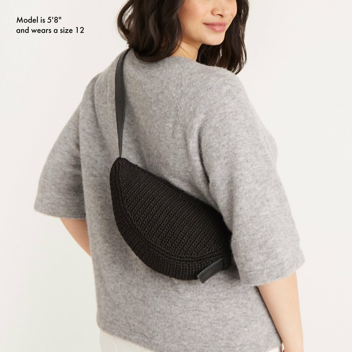 The Sak Tess Sling Bag in Black Crochet