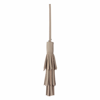 The Sak Cypress Tassel Dangle in Sand Leather