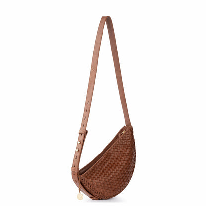 The Sak Tess Sling Bag in Woven Cognac Leather