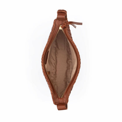 The Sak Tess Sling Bag in Woven Cognac Leather