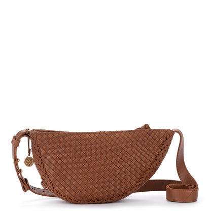 The Sak Tess Sling Bag in Woven Cognac Leather