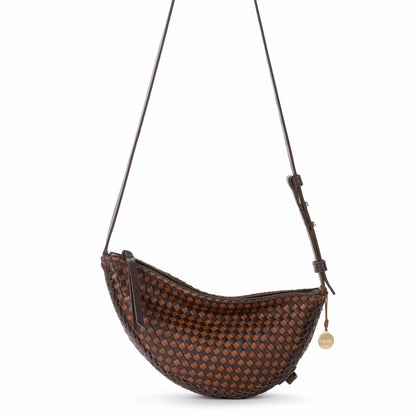 The Sak Tess Sling Bag in Woven Mahogany Cognac Leather