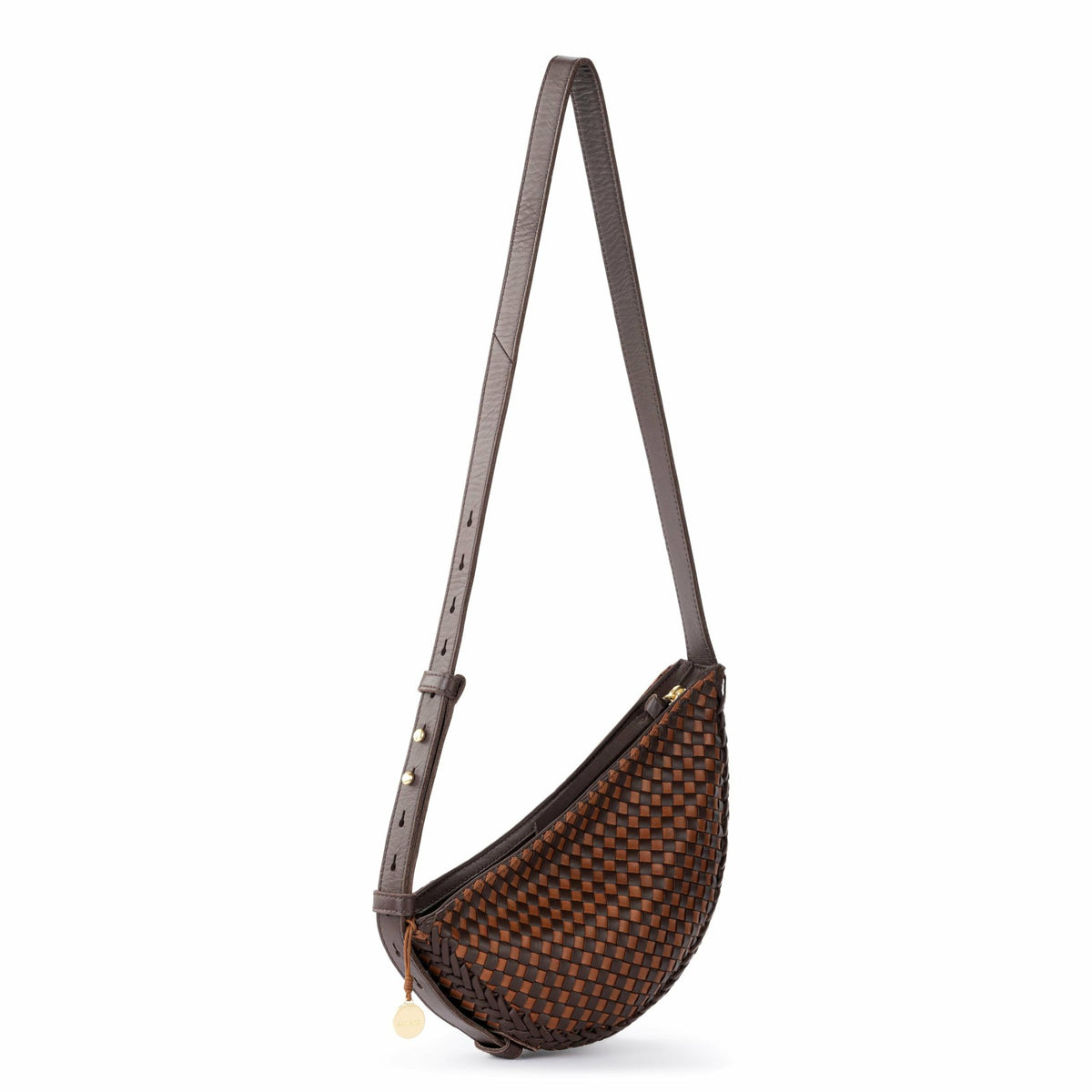 The Sak Tess Sling Bag in Woven Mahogany Cognac Leather
