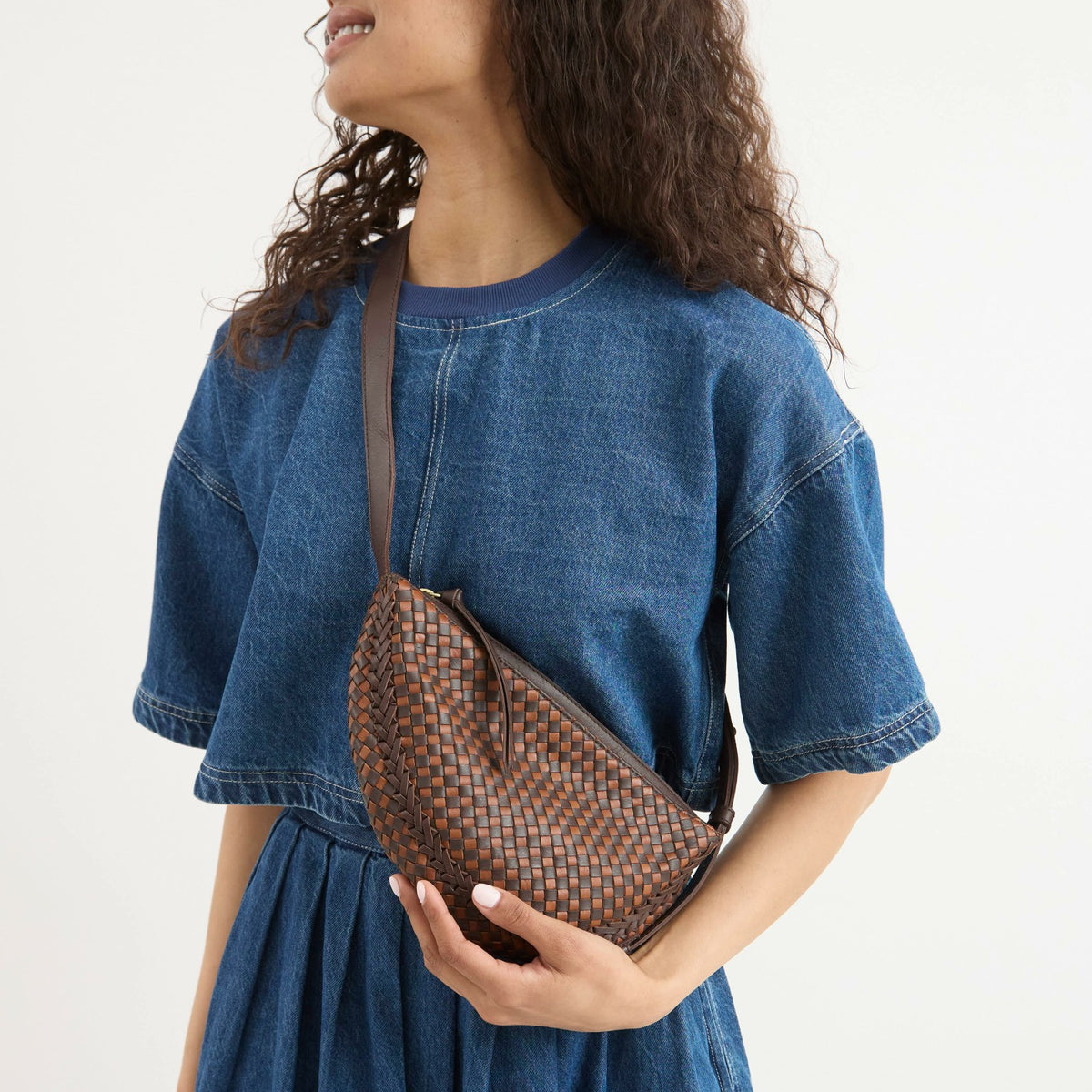 The Sak Tess Sling Bag in Woven Mahogany Cognac Leather