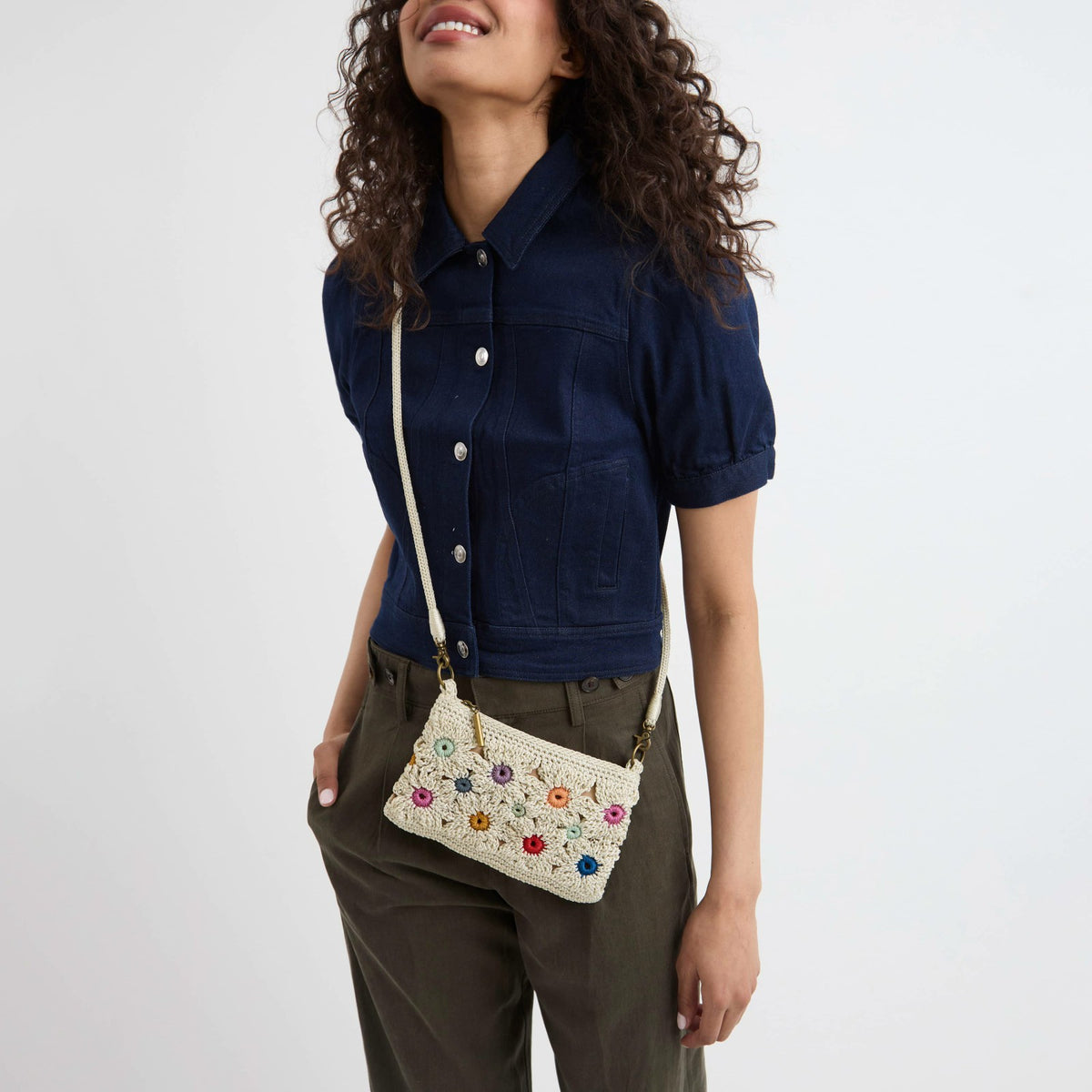 The Sak Vita Convertible Wristlet in Natural Multi Flowers Crochet