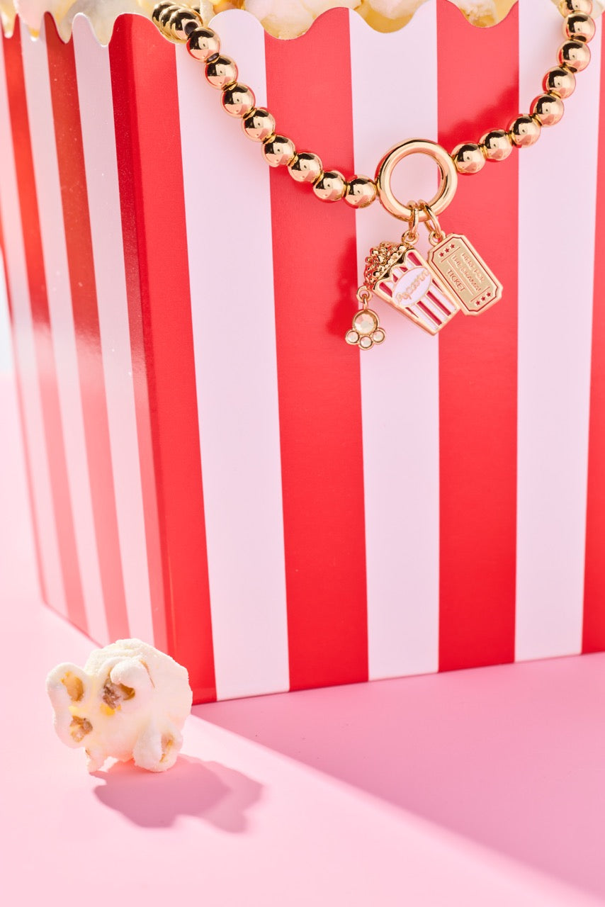 Here For The Drama!' Movie Theater Popcorn Stretch Bracelet
    
    
    
       Gold