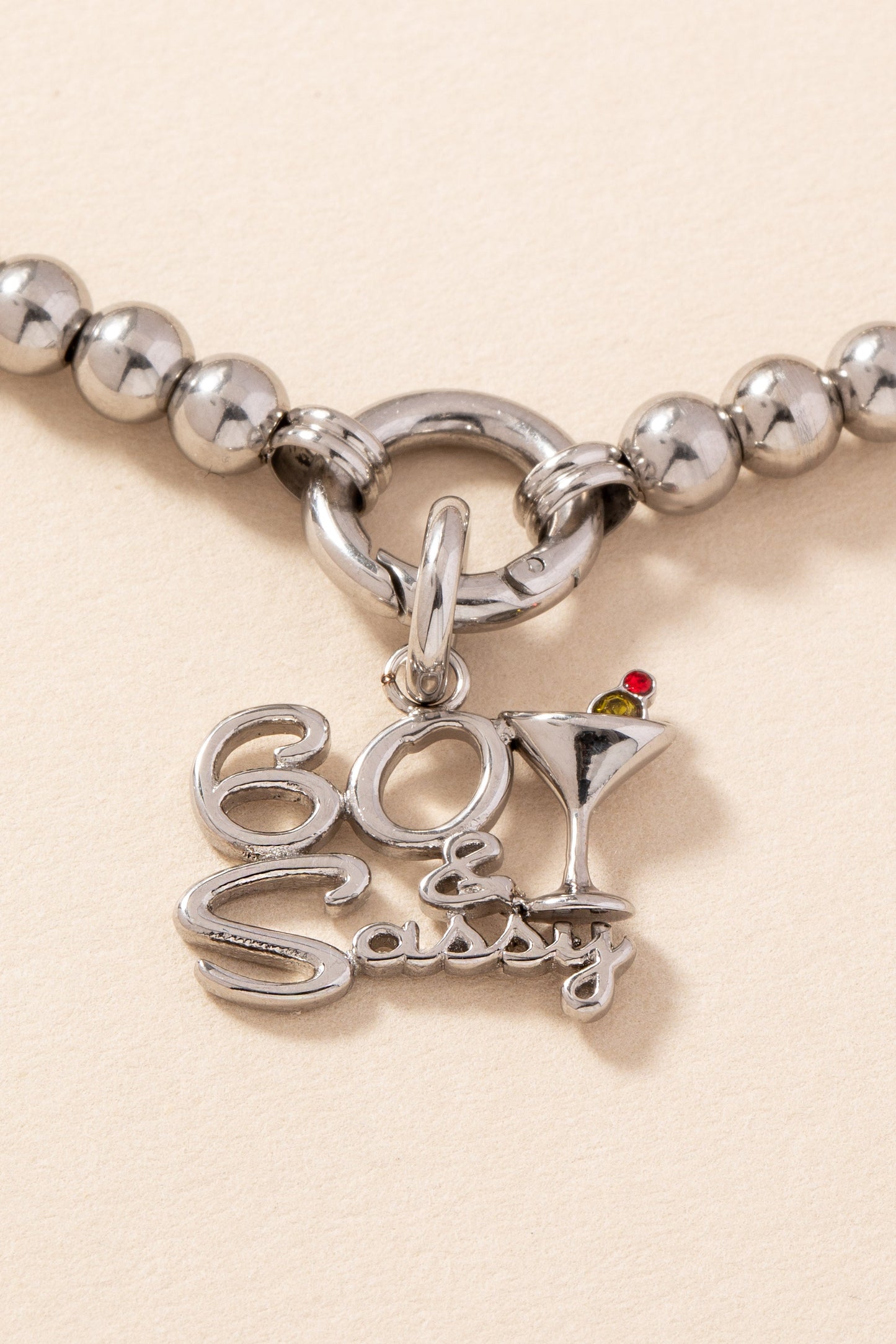 60 & Sassy Charm Stainless Steel Silver