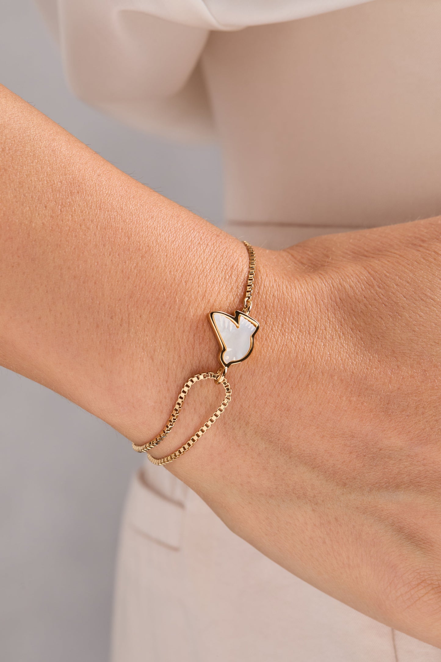 Pearlized Dove 'Peace' Pull Chain Bracelet Gold