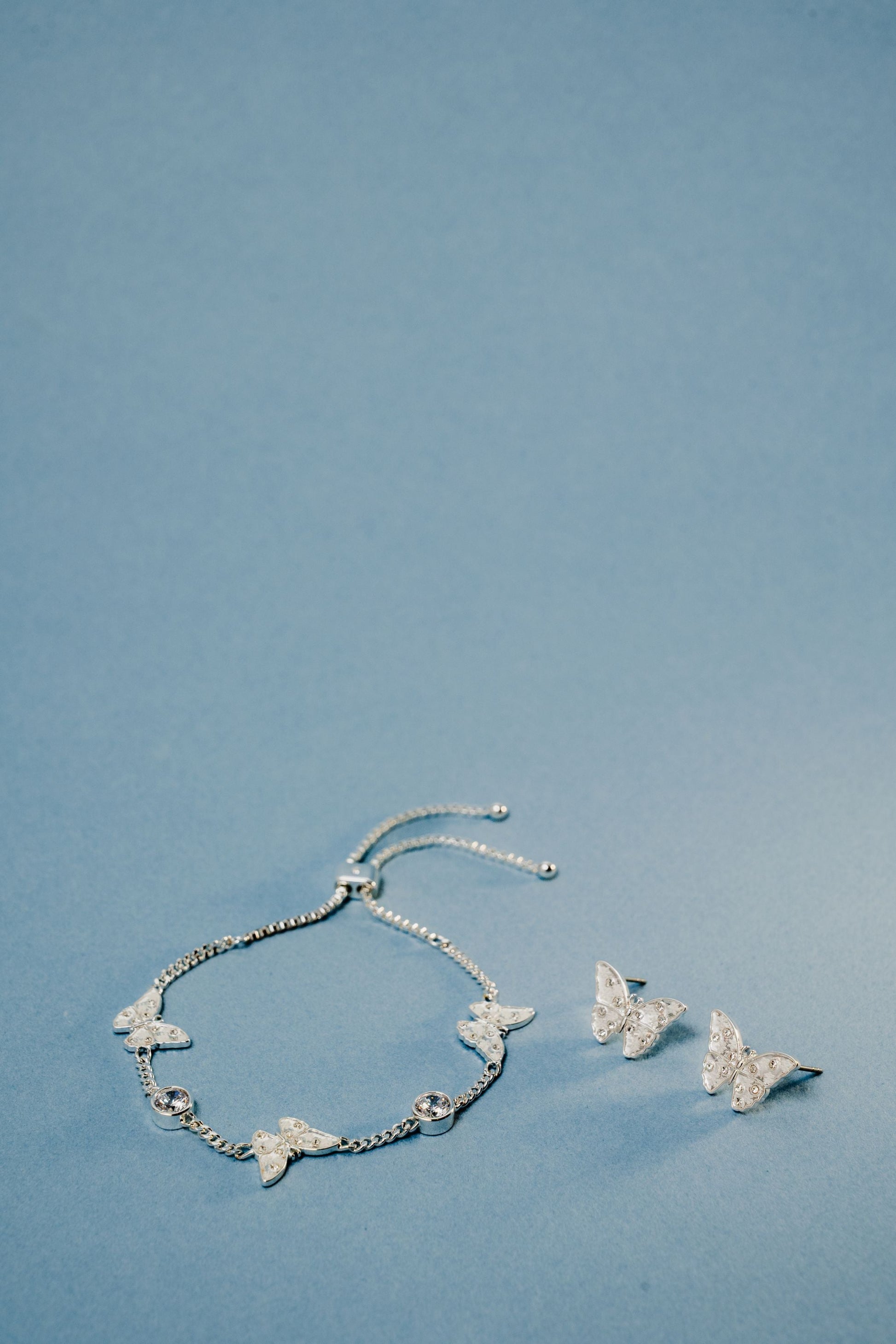 Glass Butterfly Statement Stud Silver
