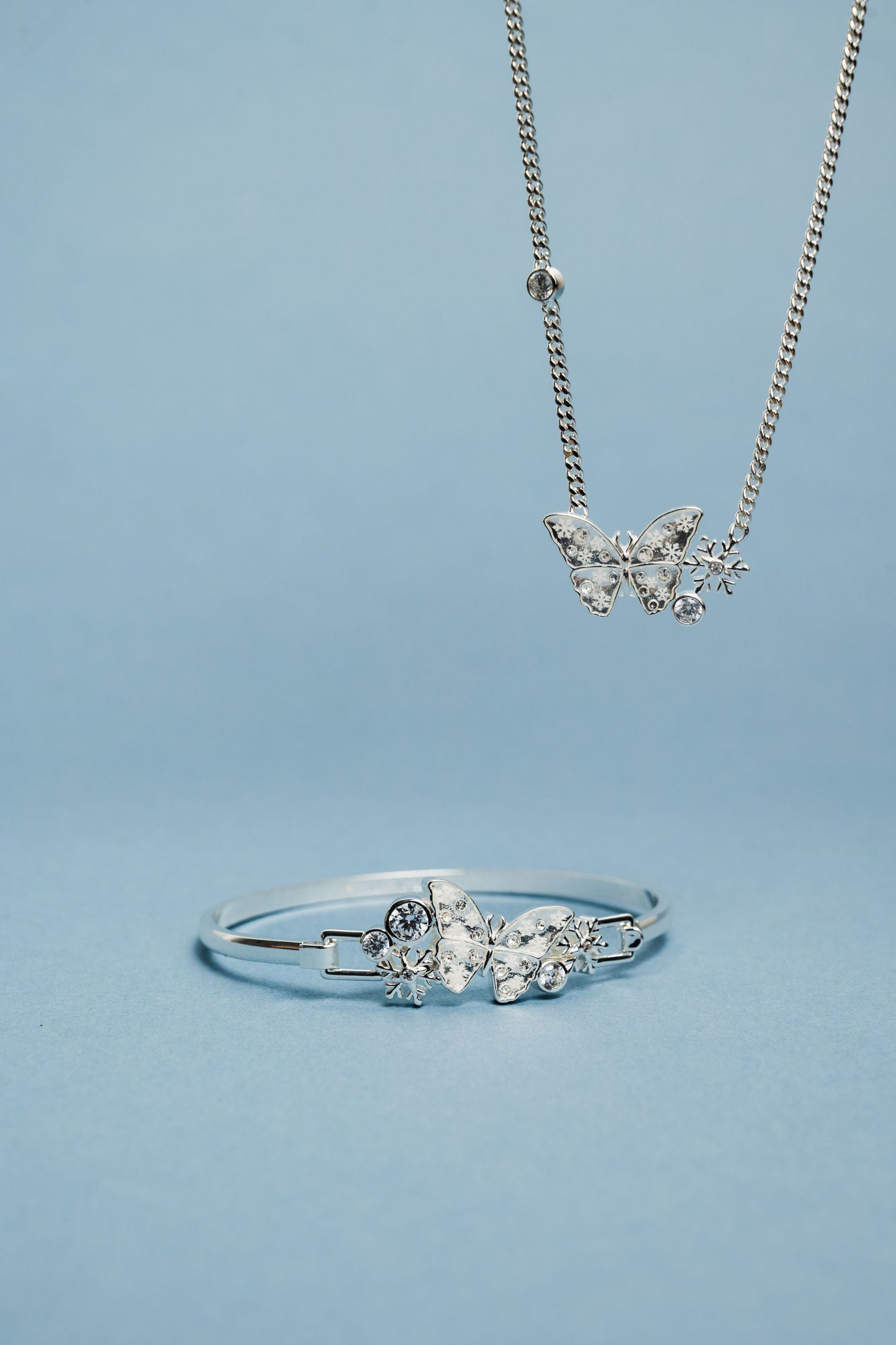 Glass Butterfly Tension Bangle Silver